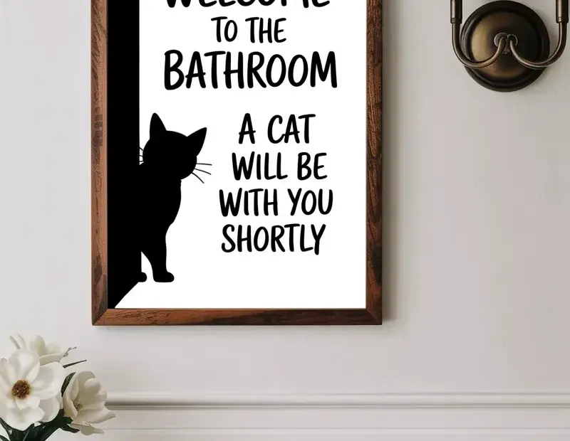 Bathroom wall art mistake to avoid: don't forget a touch of humor like this cat print
