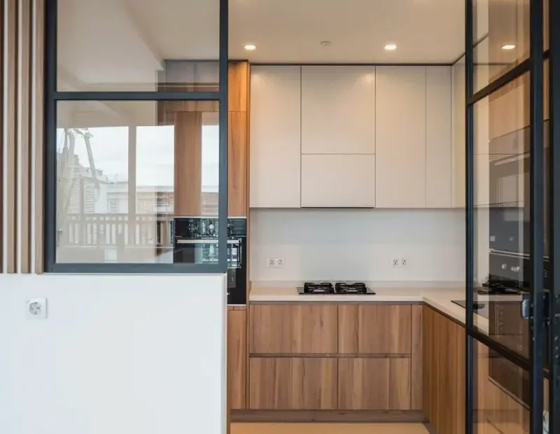 Budget Minimalist Kitchen Ideas with Black-Framed Glass and Slat Walls 🌿