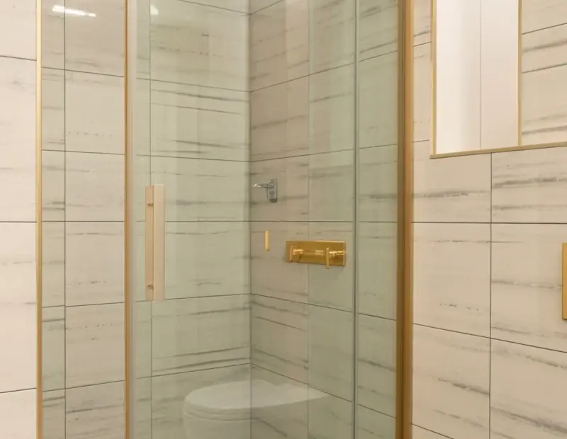 Double Sink Bathroom Vanity | Gold Hardware & Marble Tile | Modern Bathroom Remodel Idea